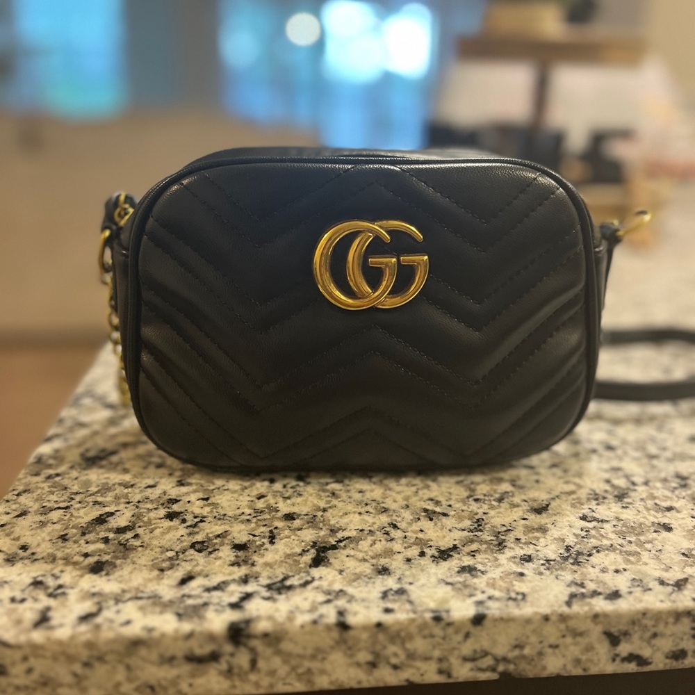 Designer inspired black crossover